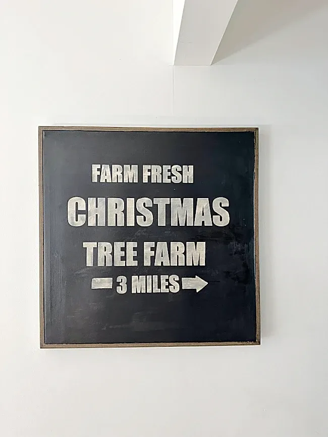 wall with Christmas sign