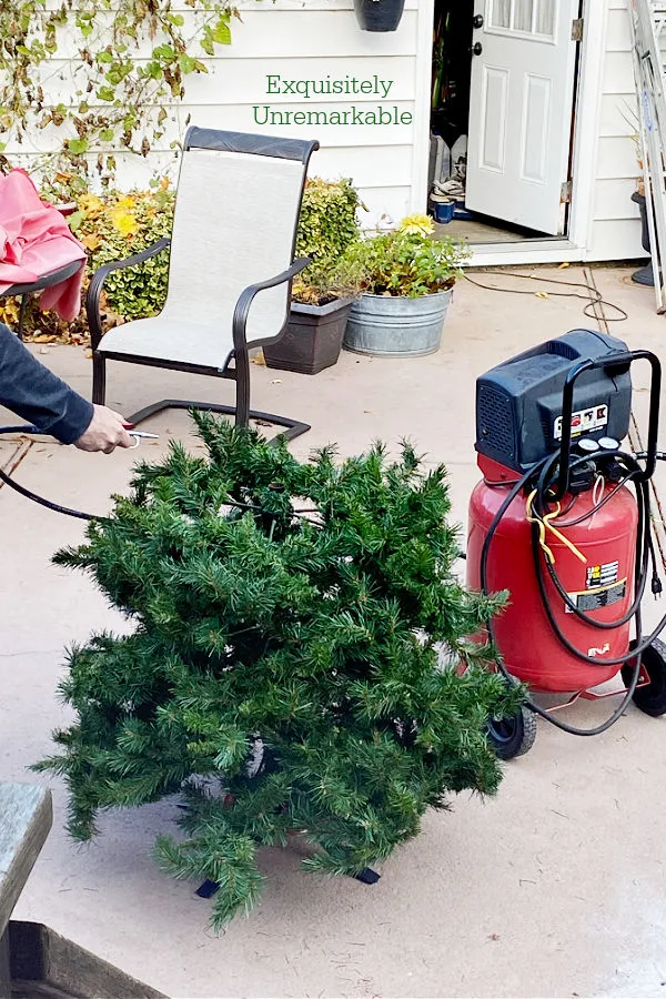 Cleaning An Artificial Tree with an air compressor