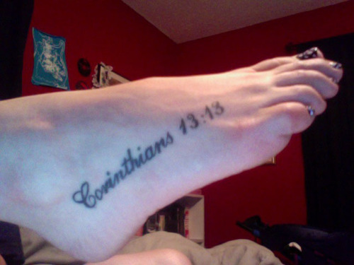 wrist is a new tattoo saying "Timothy 4:12". This is her favorite bible