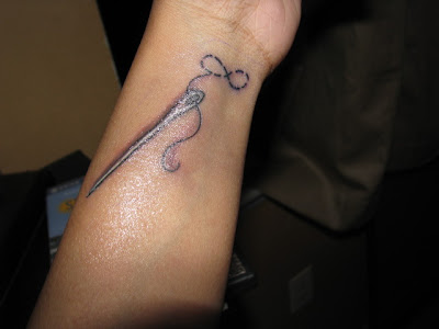  stitching the infinity symbol. You ever hear the expression tattoo tear?