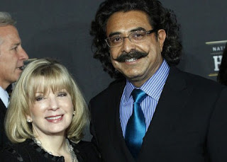Ann Carlson Khan with her husband Shahid Khan