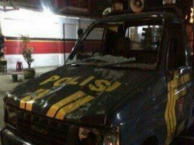 MOBIL PATROLI POLSEK BOJONG GEDE DIRUSAK ORANG YANG TIDAK DIKENAL