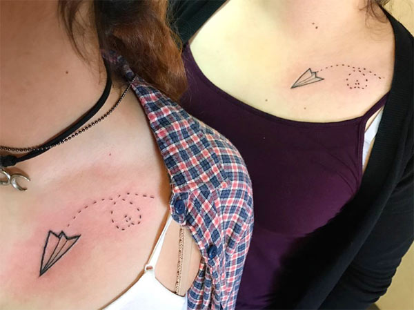 matching best friend tattoo ideas for girls paper airplane in the air lovely line work tattoo designs