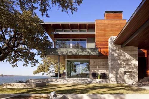 Contemporary Lake house design by Dick Clark+Associates