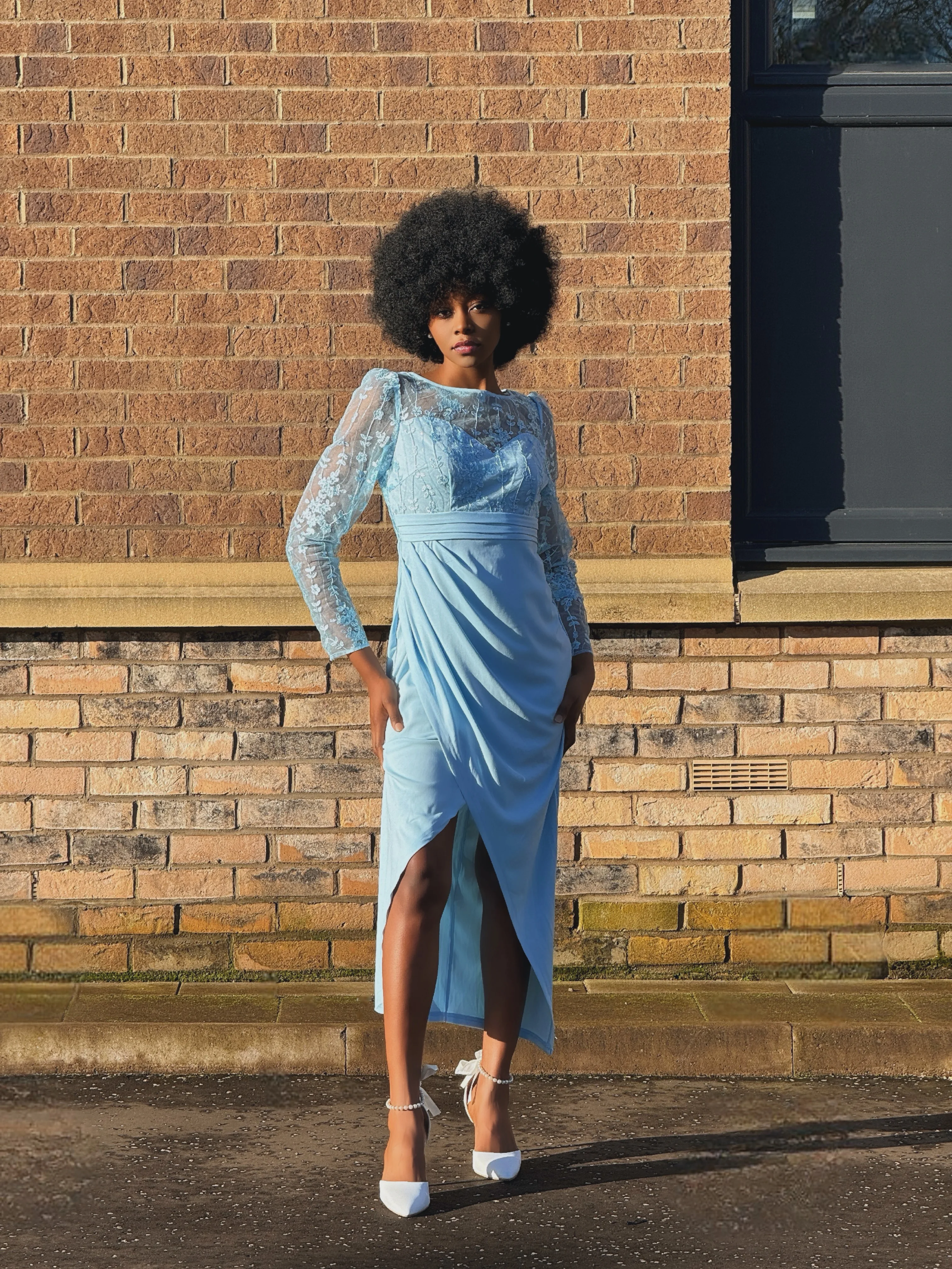 Woman wearing Lace Light Blue Long Sleeve Dress, ideal for spring bridesmaids.