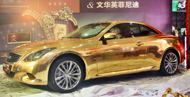 gold sports car , China brings us yet another golden head-scratcher ...