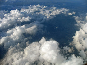 small white clouds seen from the top