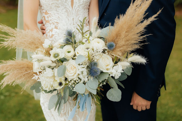 white and blue boho bridal bouquet with pampas