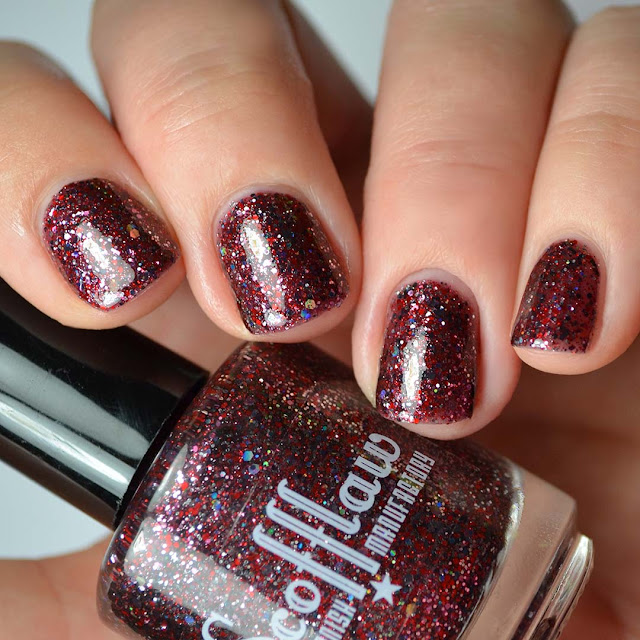 red nail polish with red and holo glitter swatch