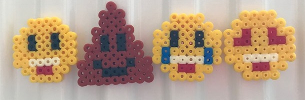Hama bead emoji magnets on the radiator