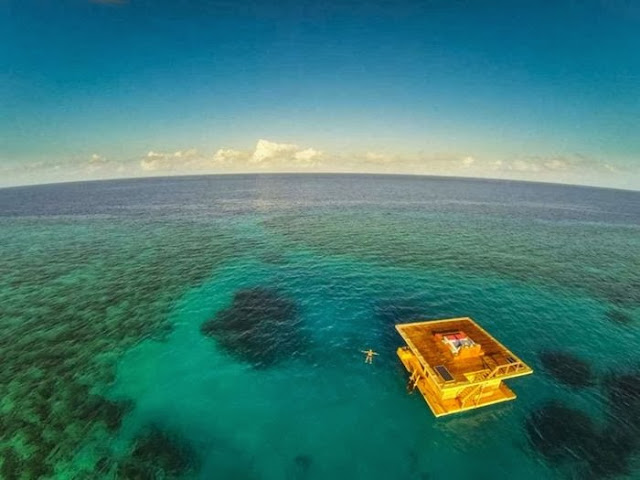 Underwater accommodations seem to have become a trend among hotels in recent years. The Manta Resort is now putting a unique spin on this concept. The underwater room has been revealed recently, a three-floor suite that floats beside a thriving coral reef and boasts a submerged master bedroom surrounded by windows to view the local sea life.
