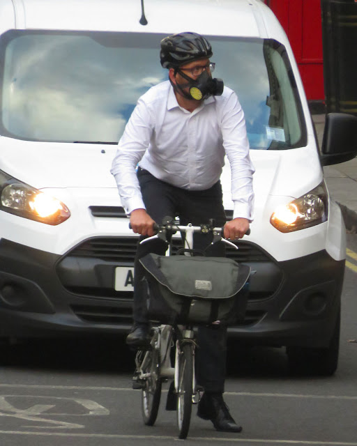 Cyclist on the Strand, London