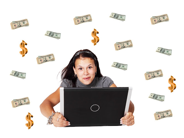 Girl with laptop and money