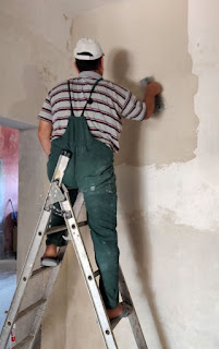 Bekir polishing the new plaster