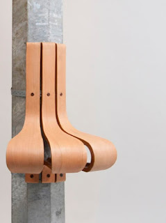 Wanderest is a seat that attaches to round or octagonal lamppost