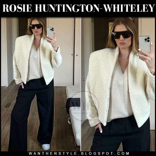 Rosie Huntington-Whiteley in cream teddy jacket and black trousers