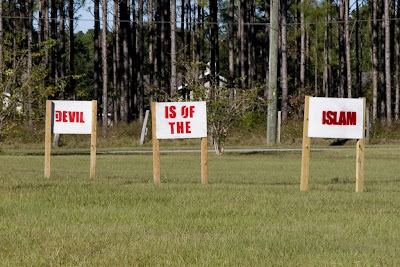 'Islam is of the Devil' proclaim the signs on the grounds of the Dove World Outreach Center