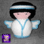 http://www.ravelry.com/patterns/library/angel-kokeshi-doll-2