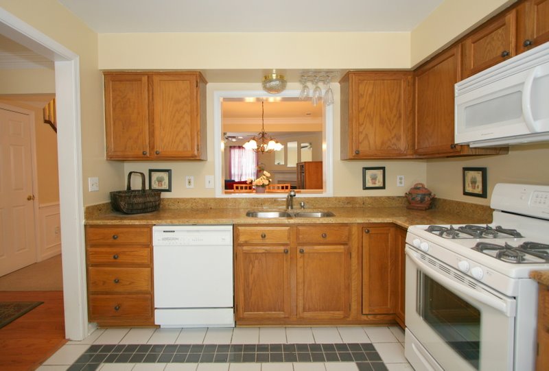 White Kitchens With Black Appliances