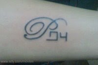 Nayanthara with Prabhu tattoo (P in English and the rest in Tamil)