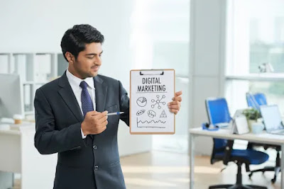 Health care marketing Company men in suit with a pen and small board in Hands in board a small sentence is write Digital marketing.