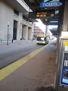 bus approaching East Bank light rail stop