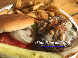 Nice blackening, light crumbled bleu cheese on a burger patty for the Paradise Grille black and bleu burger