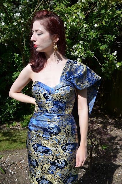 Blue and gold brocade dress with retro tiki dress style fitted bodice with sash retro dressmaking vintage sewing