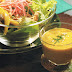 Salad Greens in Hot  Mango Coulis