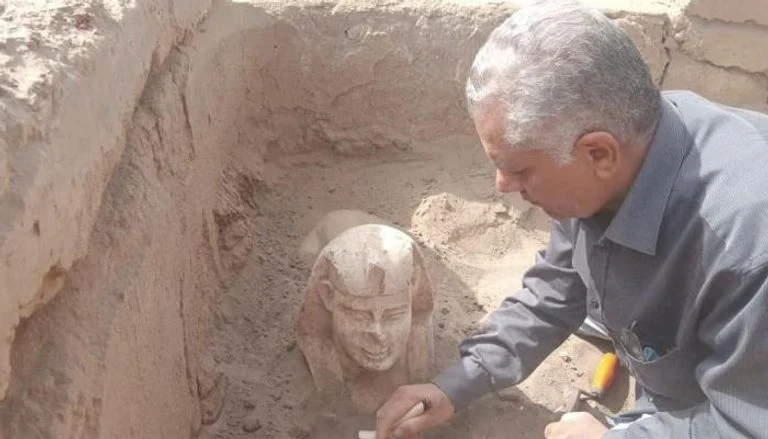 Sphinx in Egypt | The discovery of the smiling Sphinx in Egypt (photos)  The Ministry of Tourism and Antiquities in Egypt announced, on Monday, the discovery of a statue of the Great Sphinx and the remains of Claudius' cabin next to the Dendera Temple in Qena Governorate.    The Egyptian archaeological mission from Ain Shams University, headed by Prof. Mamdouh El-Damaty, former Minister of Antiquities and Professor of Archeology at Ain Shams University, revealed the remains of a limestone cabin dating back to the Roman era, during archaeological excavations in the area east of the Dendera Temple in Qena Governorate, in which a temple of the god Horus was built in the Roman era.    Dr. Mamdouh El-Damaty said that the remains of the cabin are a platform consisting of two levels with a foundation and sloping floors.    He added that during the cleaning work of the basin, a limestone sphinx statue was found representing one of the Roman emperors, wearing the headdress known as the Nemes, with a cobra serpent above his forehead, indicating that the initial examination of the face of the statue indicates that it is likely to be of Emperor Claudius.    Dr. Mamdouh El-Damaty described the statue as wonderfully beautiful, as its face is distinguished by royal features depicted accurately, and a light smile appears on its lips, which have two dimples on both sides, and the remains of yellow and red appear on its face. A painting from the Roman era written in hieroglyphs and demotic was also found below the statue.    The mission will continue excavations in the area of the Horus Temple, east of the Dendera Temple, and in front of the Isis Gate, to uncover the road linking them, according to Dr. Mostafa Waziri, Secretary-General of the Supreme Council of Antiquities in Egypt.    It is noteworthy that the mission had begun excavation work in mid-February, as it conducted a radar survey of the Osirian halls of the Dendera Temple, and a magnetic and radar survey in the area east of the wall surrounding the temple in front of the Isis Gate, with the knowledge of a team from the National Institute for Astronomical and Geophysical Research.