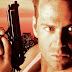 John McClane - O Homem Impossível de Ser Parado e Duro de Matar.