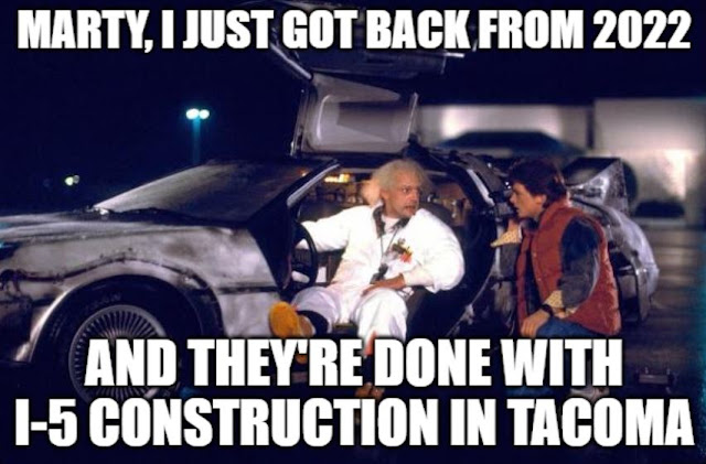 Marty and Doc from back to the future, with text overlay that says Marty, I just got back from 2022 and they're done with I-5 construction in Tacoma