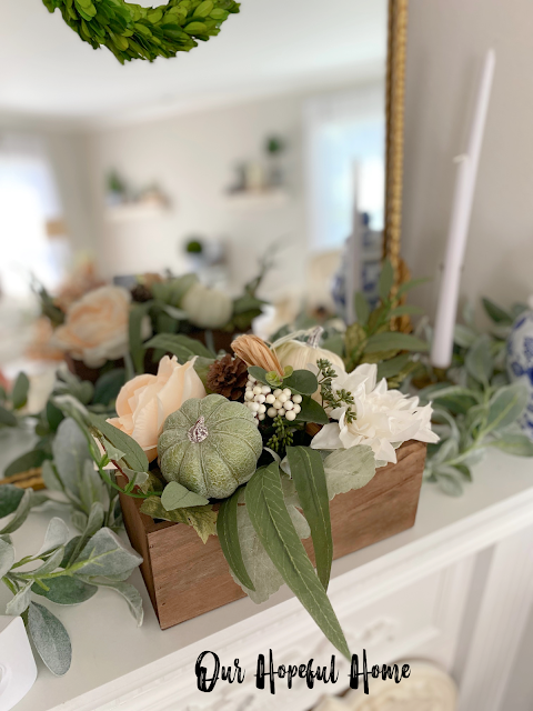 rustic floral centerpiece with pumpkins