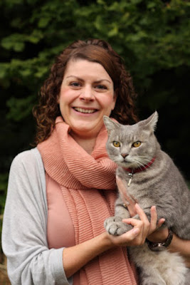 Dr Sarah Ellis with her cat Cosmos
