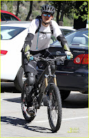 Orlando Bloom Bikes with a friend