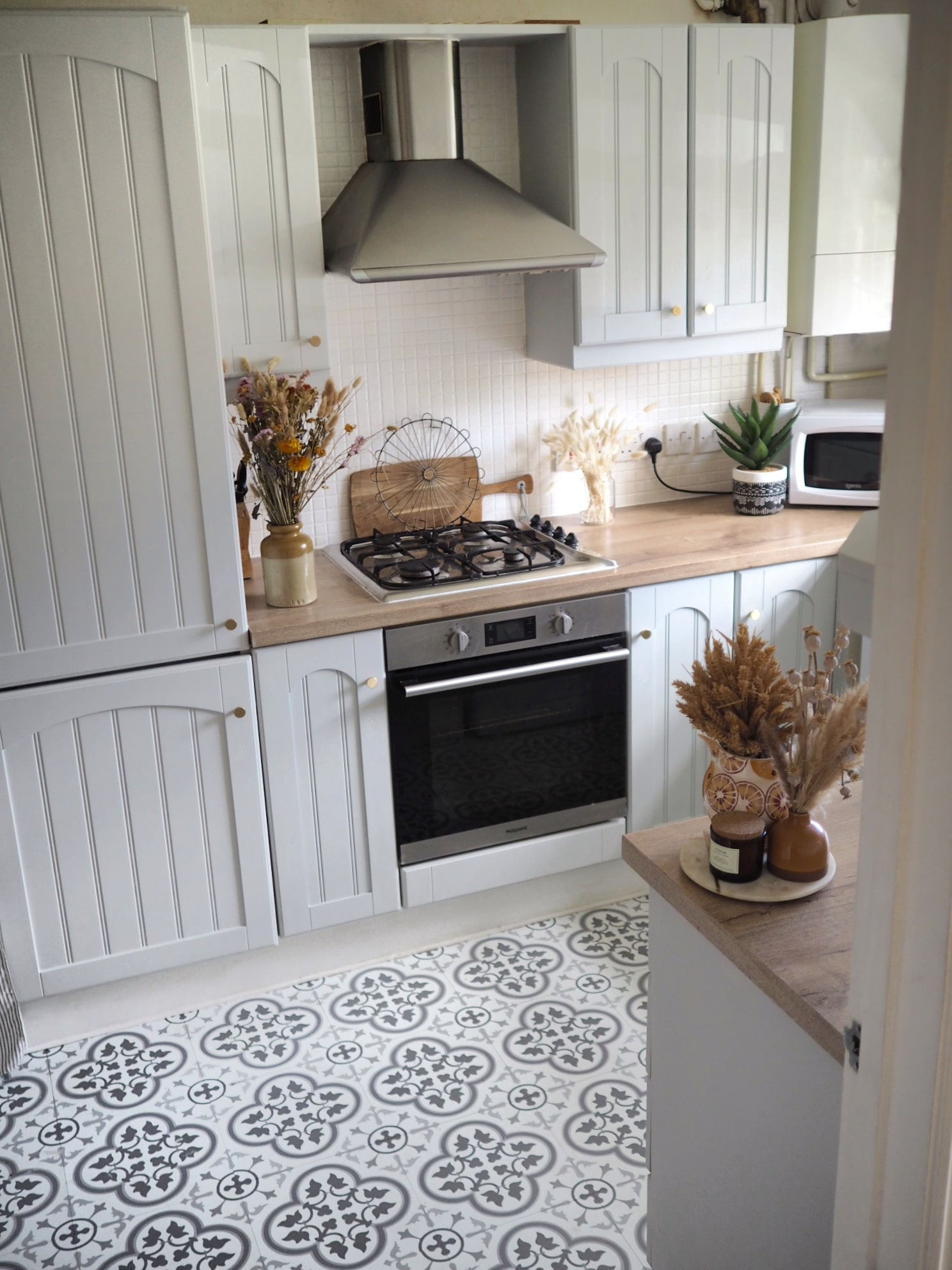 How to paint your kitchen cupboards on a budget. Remove vinyl wrap and paint an mdf kitchen using a heat gun. Kitchen makeover renovation inspiration