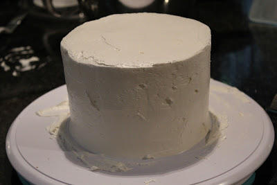 Frosting a layer cake