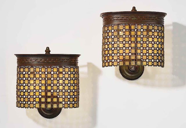 1904 Tiffany wall lamps with brown glass, a color photograph