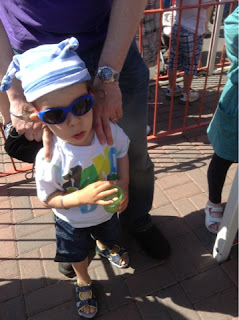 toddler in a pirate hat and sunglasses