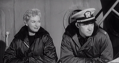 Maggie Hathaway (Shawn Smith) and Cmdr. Roberts (Jock Mahoney) aboard ship