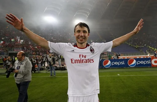 AC Milan midfielder Mark van Bommel celebrates after winning the Scudetto