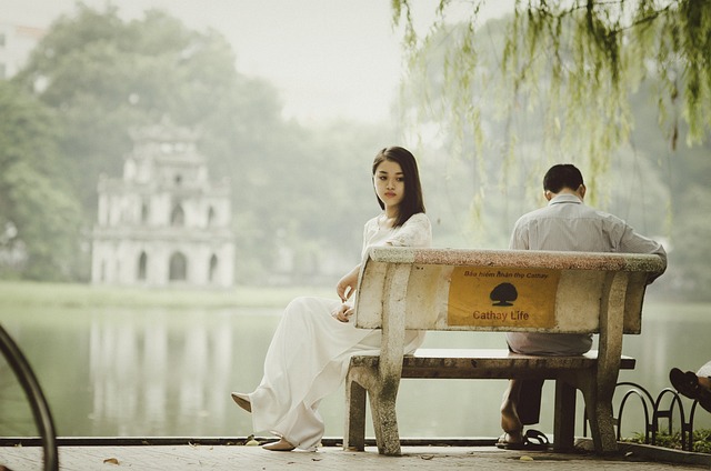 A very beautiful scene of a couple sitting on the bench- sad girl dp