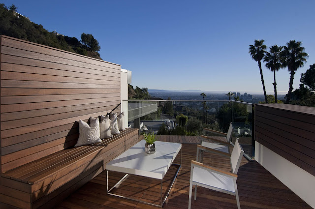 Picture of wooden furniture on the small balcony