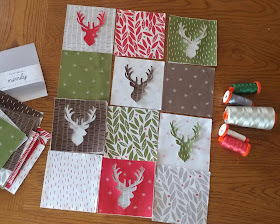 Christmas deer quilt using Merrily by Moda and Aurifil thread