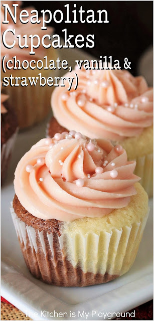 Neapolitan Cupcakes ~ Beautiful, tender 1/2-chocolate & 1/2-vanilla two-tone cupcakes, topped with fluffy strawberry frosting.  It's the classic Neapolitan flavor trio in one tasty little cake! They're perfectly delicious, and simply perfect for any birthday.  www.thekitchenismyplayground.com