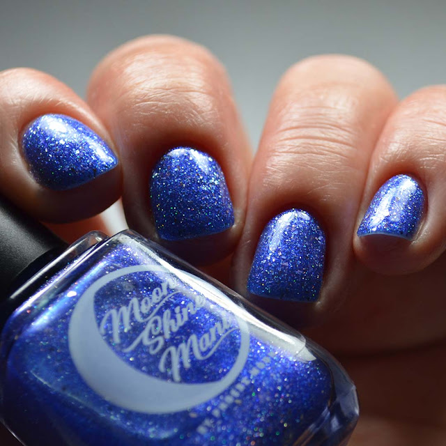 blue metallic nail polish low light swatch