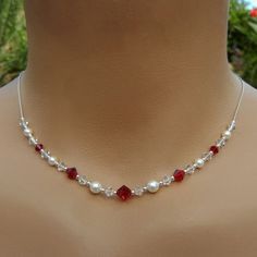 https://www.amazon.in/gp/search/ref=as_li_qf_sp_sr_il_tl?ie=UTF8&tag=fashion066e-21&keywords=pearls with red beads&index=aps&camp=3638&creative=24630&linkCode=xm2&linkId=714a67df8253884d8fb68ab5bca5adf0