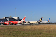 . Singapore Airlines A330343E 9VSTK in gate 53, and China Southern . (air asia singapore airlines china southern)