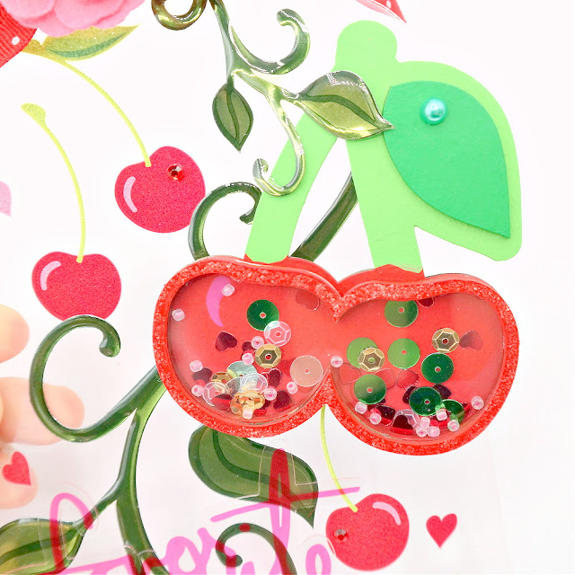 Chipboard Cherry Shaker Embellishment Colored with Acrylic Paint and Filled with Red Pink and Green Sequins and Beads