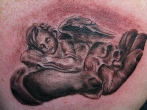 angel and cherub tattoos. of baby angel tattoos in